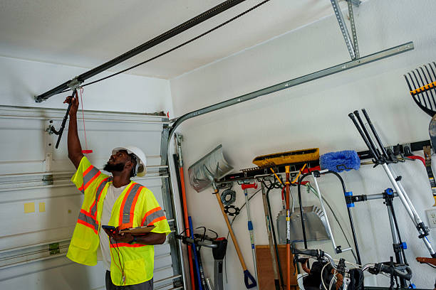 Professional Garage Door Panel Replacement technician working in Hines, OR